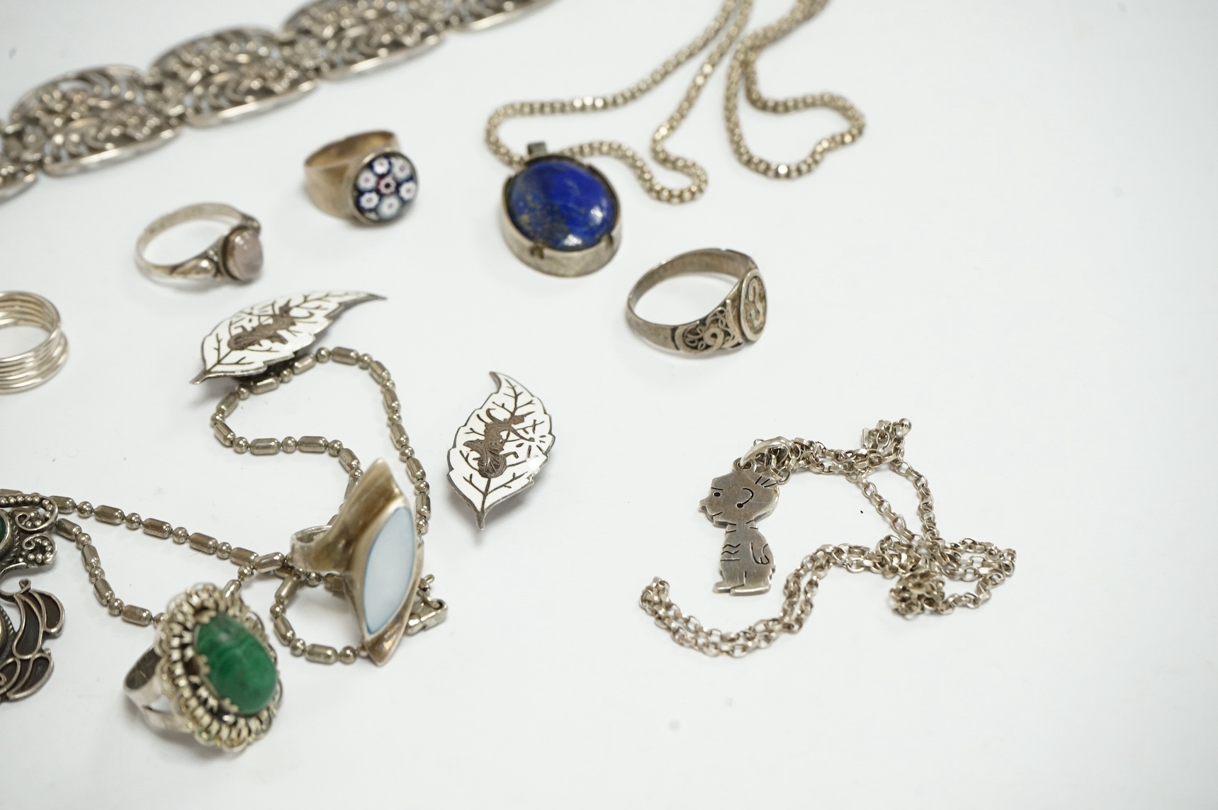 A small quantity of 925 and white metal jewellery including rings, bracelets and pendants. Condition - fair
